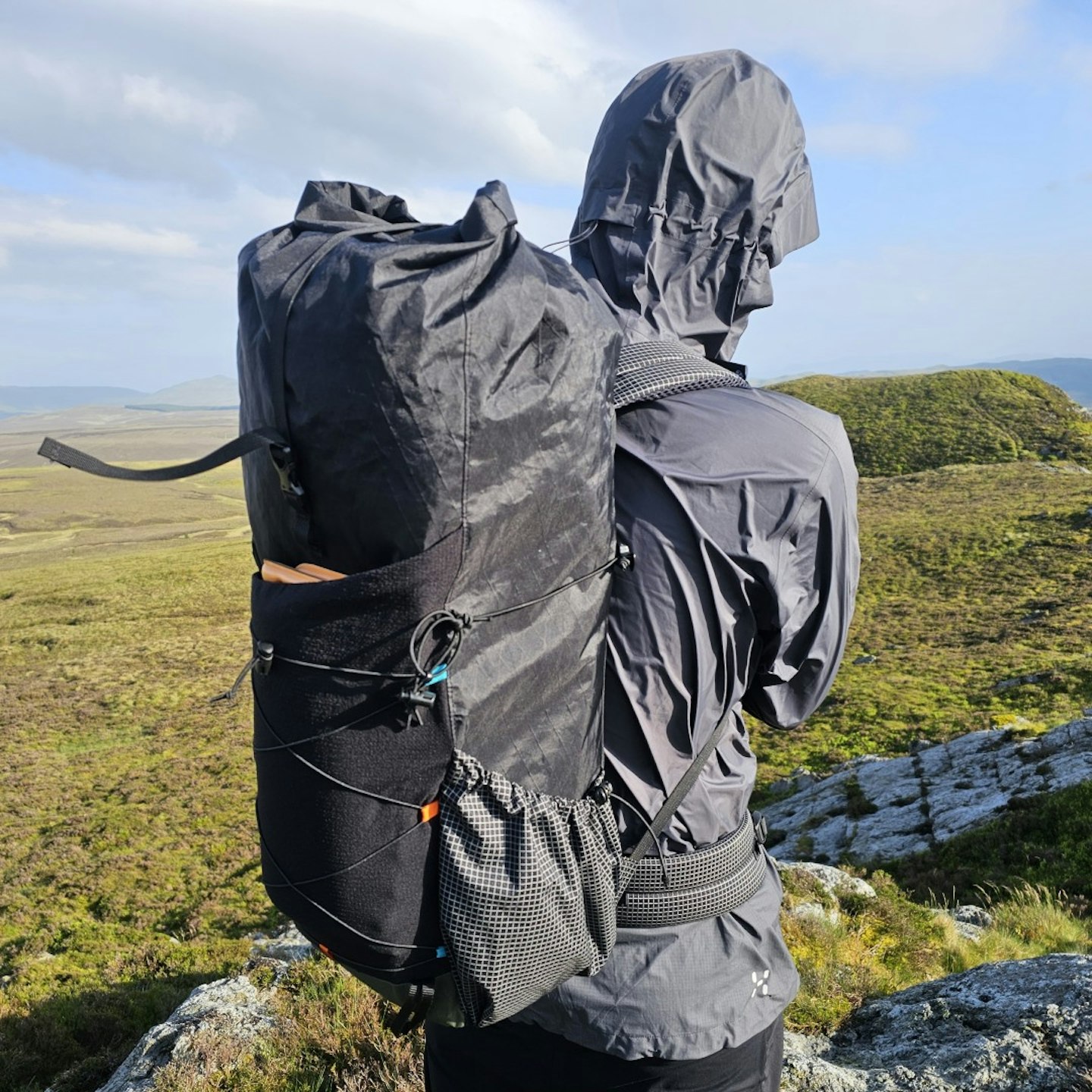 Hiker wearing Atom+ EP50