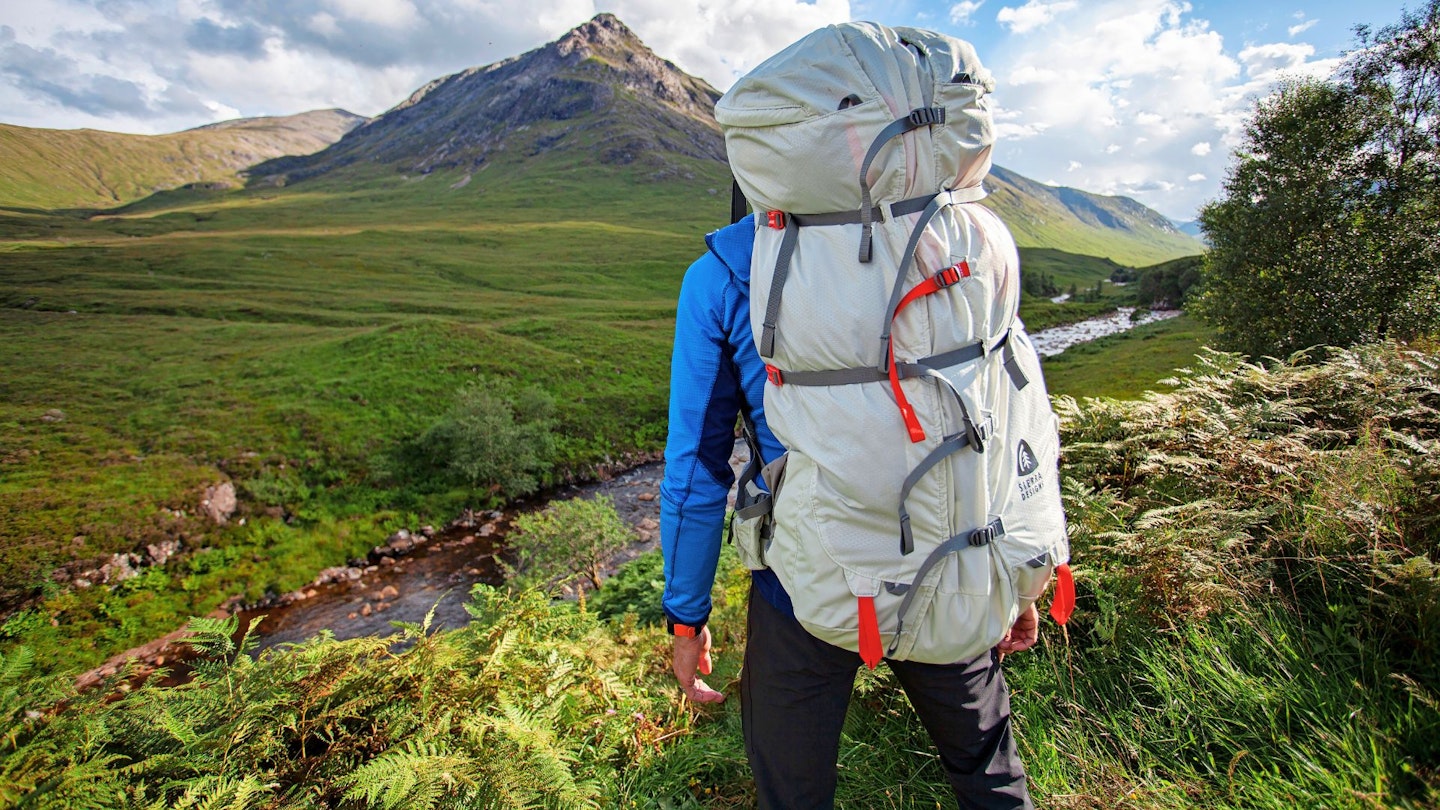 LFTO tester carrying a large hiking backpack on a trek