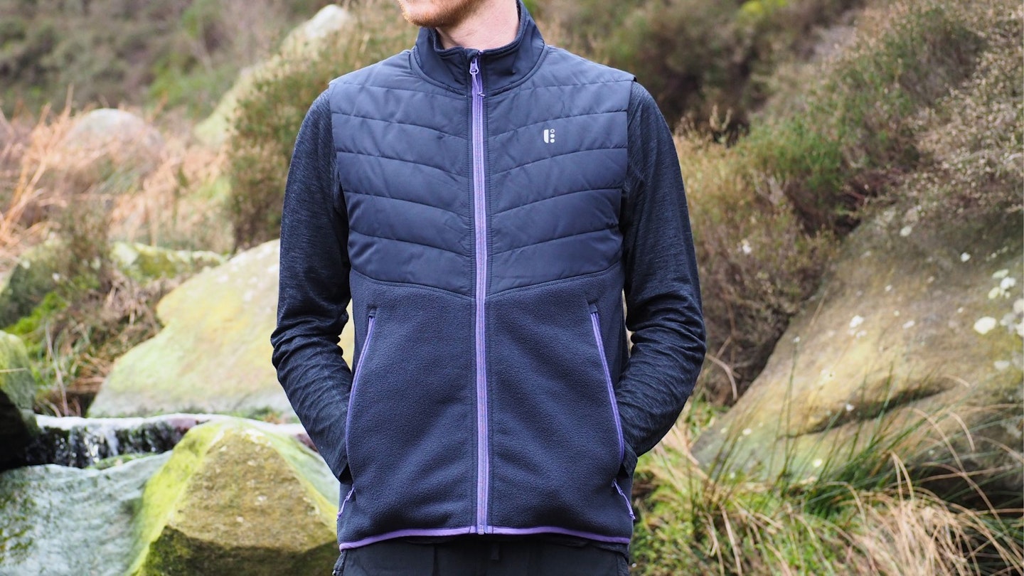 Hiker wearing BAM 73 Zero Fleece Gilet