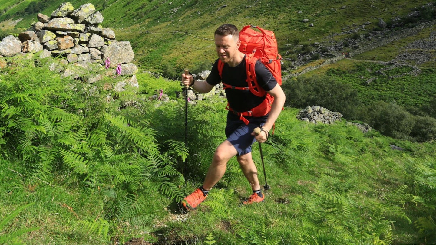 Climbing a hill wearing hiking shoes