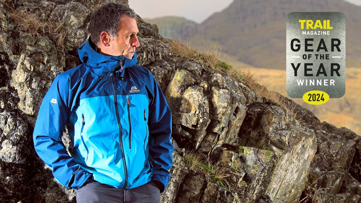 Hiker wearing Mountain Equipment Makalu jacket with Gear of the Year award logo