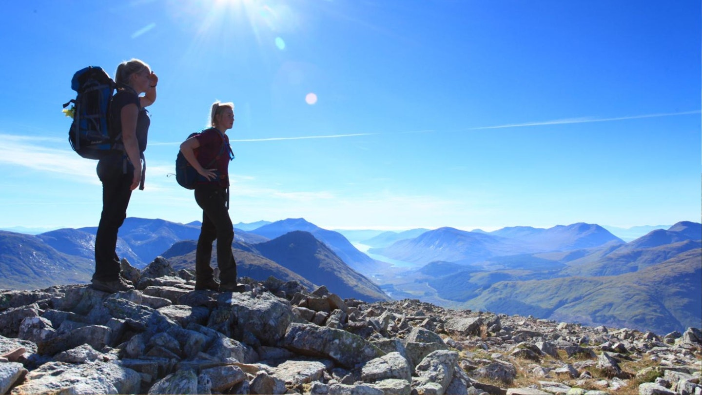 On the summit of Buachaille Etive Mor with Gen Coe and Loch Leven beyond