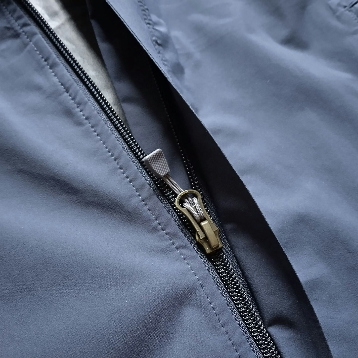 Sherpa Adventure Gear Nima 2.5-Layer Jacket zip and stormflaps